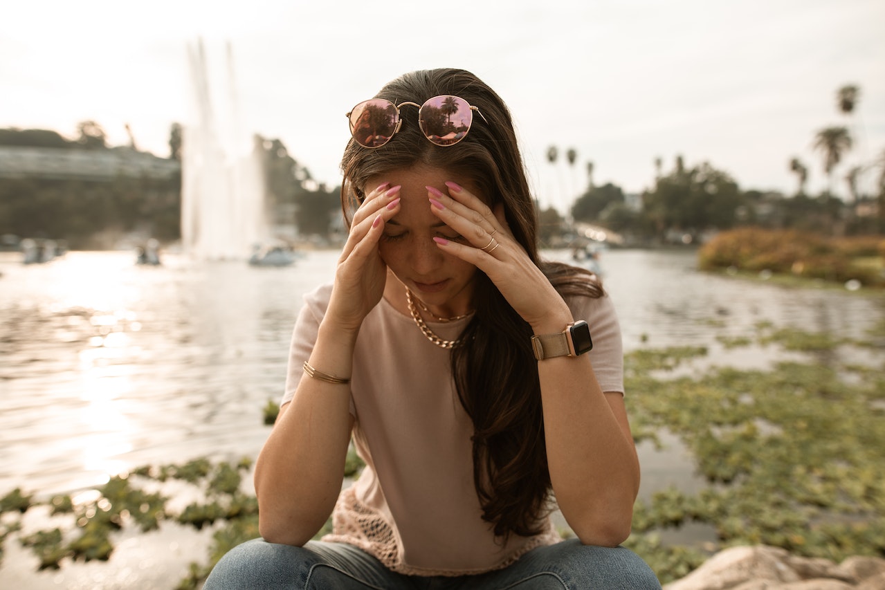 Distressed woman worried about common pitfalls when selling land by owner